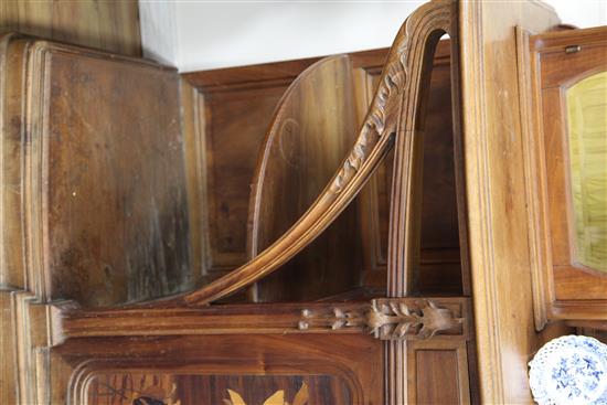 A Louis Majorelle Chicoree pattern walnut and marquetry buffet, W.7ft 4in. D.1ft 10in. H.6ft 6in.